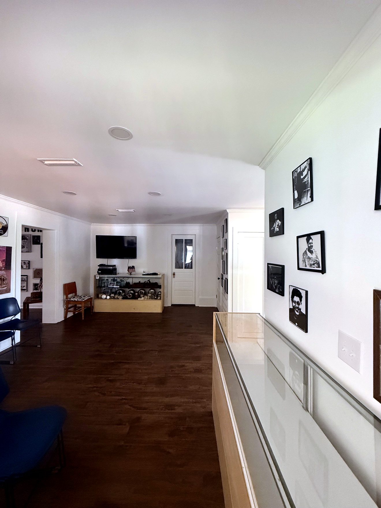 Inside the Ariton Museum — display cases and photographs on the wall